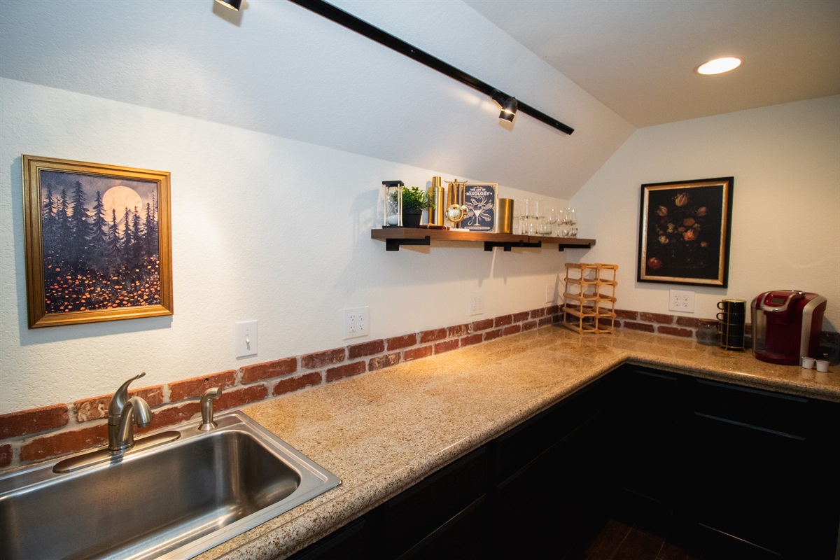 Mix up your favorite drinks or enjoy your morning cup of coffee in this downstairs wet bar!