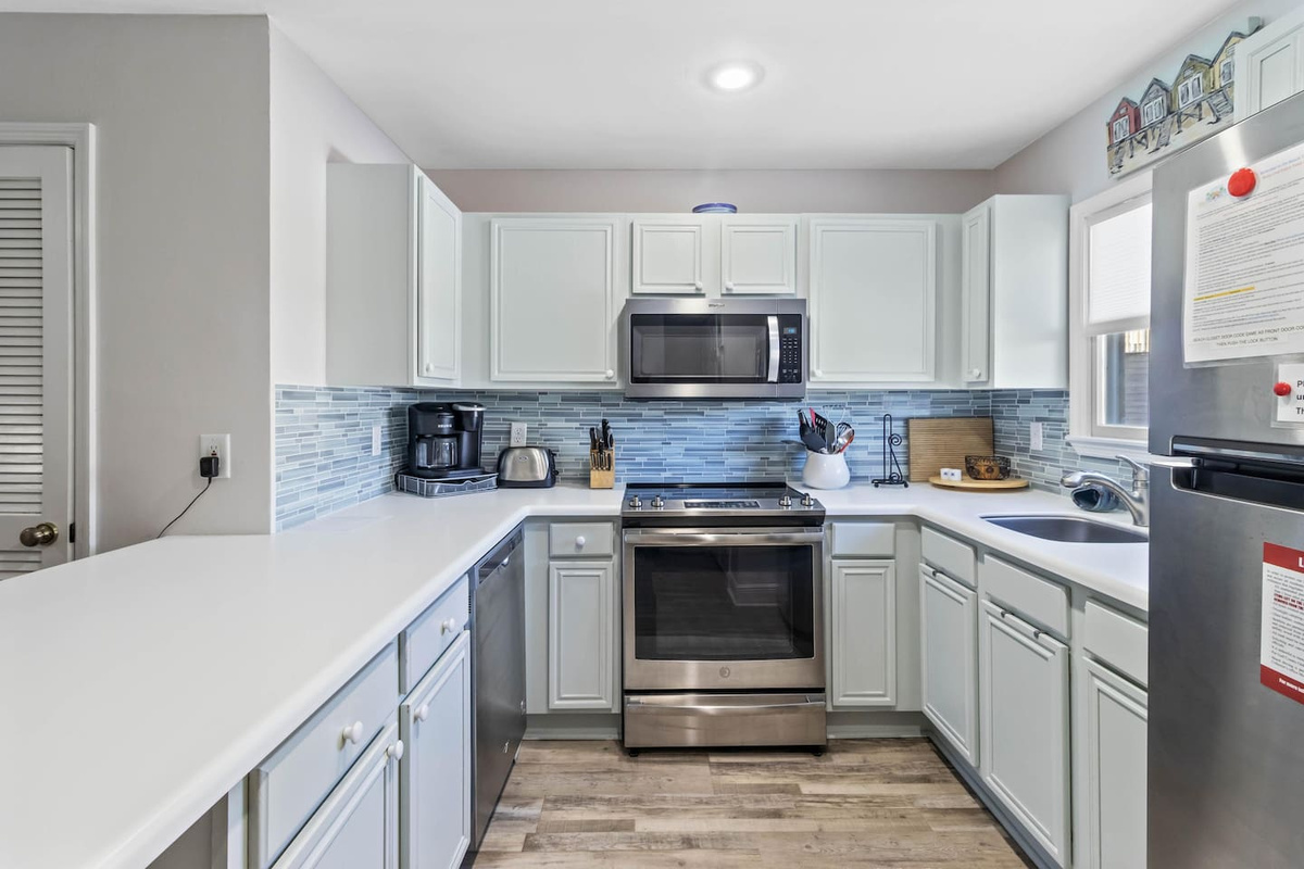 Find everything you need already in here &mdash; stainless appliances, counter space to spread out, and a setup that handles a group of six.