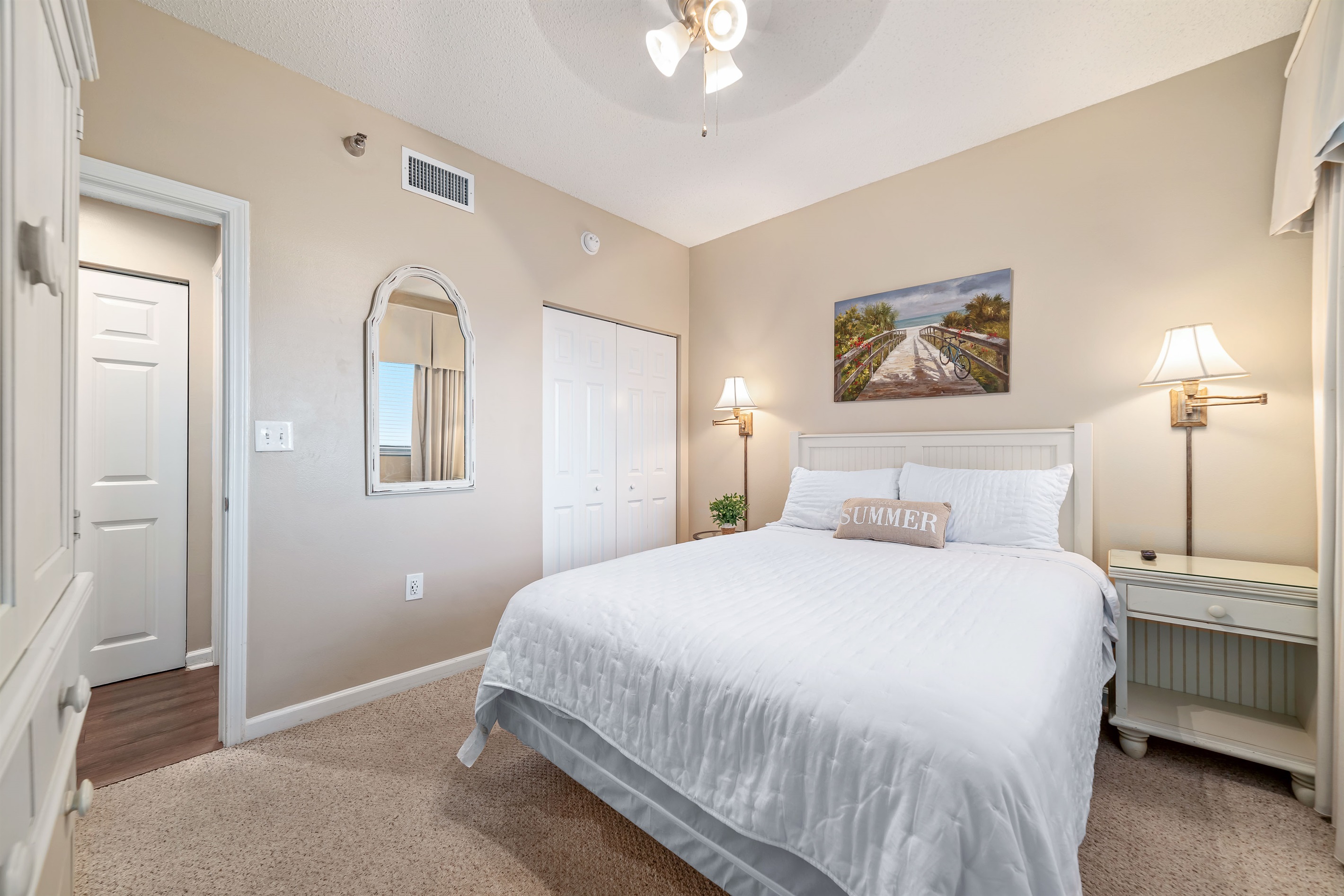 A comfortable guest bedroom, ready to welcome visitors with its cozy ambiance and ample storage.