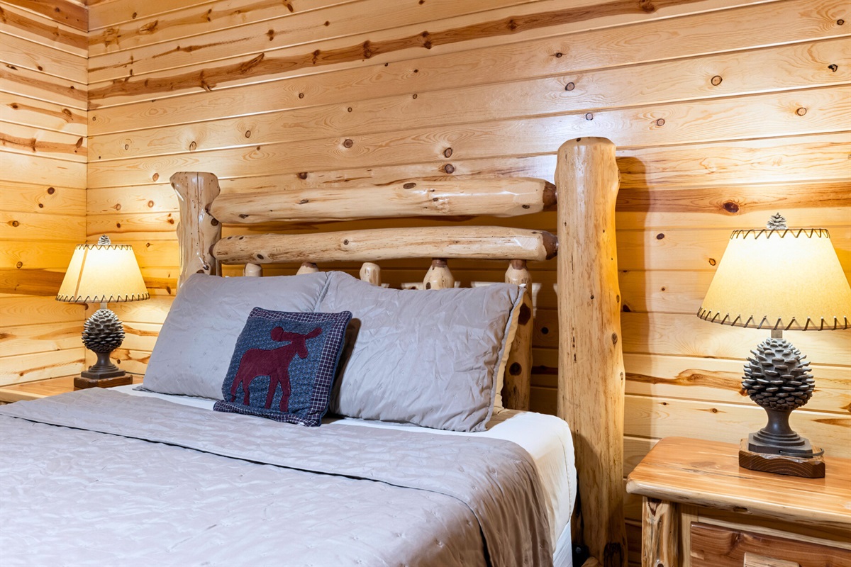 Bedroom 2 with cozy log bed and rustic comfort.