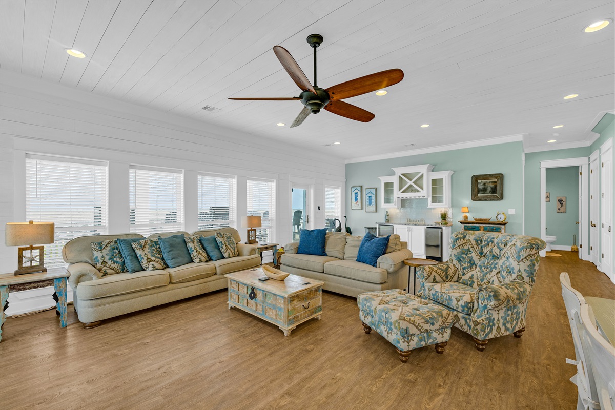 Sea It All: Crafted with the utmost attention to detail, this expansive space seamlessly blends elegance with functionality, creating an atmosphere of refined comfort and style.