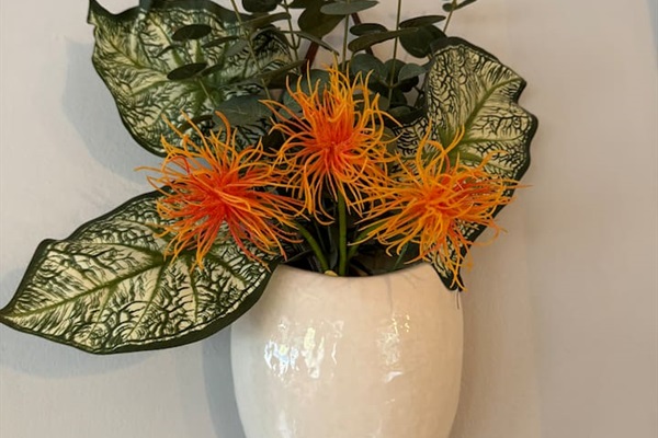 Tropical landscaping throughout.