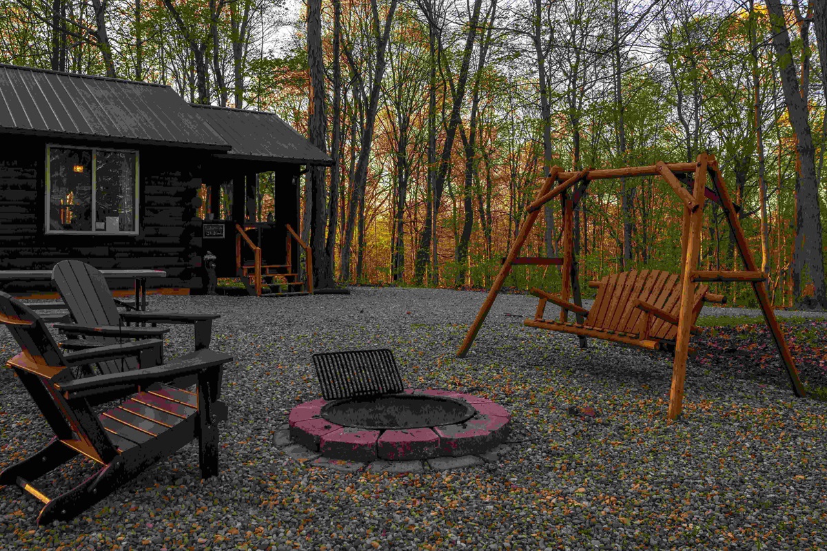 Relax around the firepit in either the Adirondack chairs or swing.