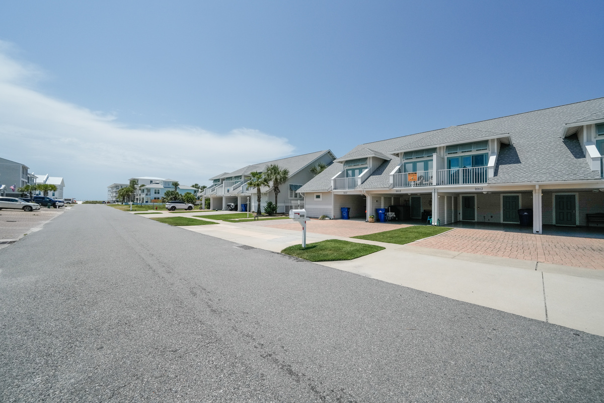 Enjoy a peaceful neighborhood setting with wide streets, modern homes, relaxing atmosphere, convenient parking, and easy access to the beach, restaurants, and local attractions