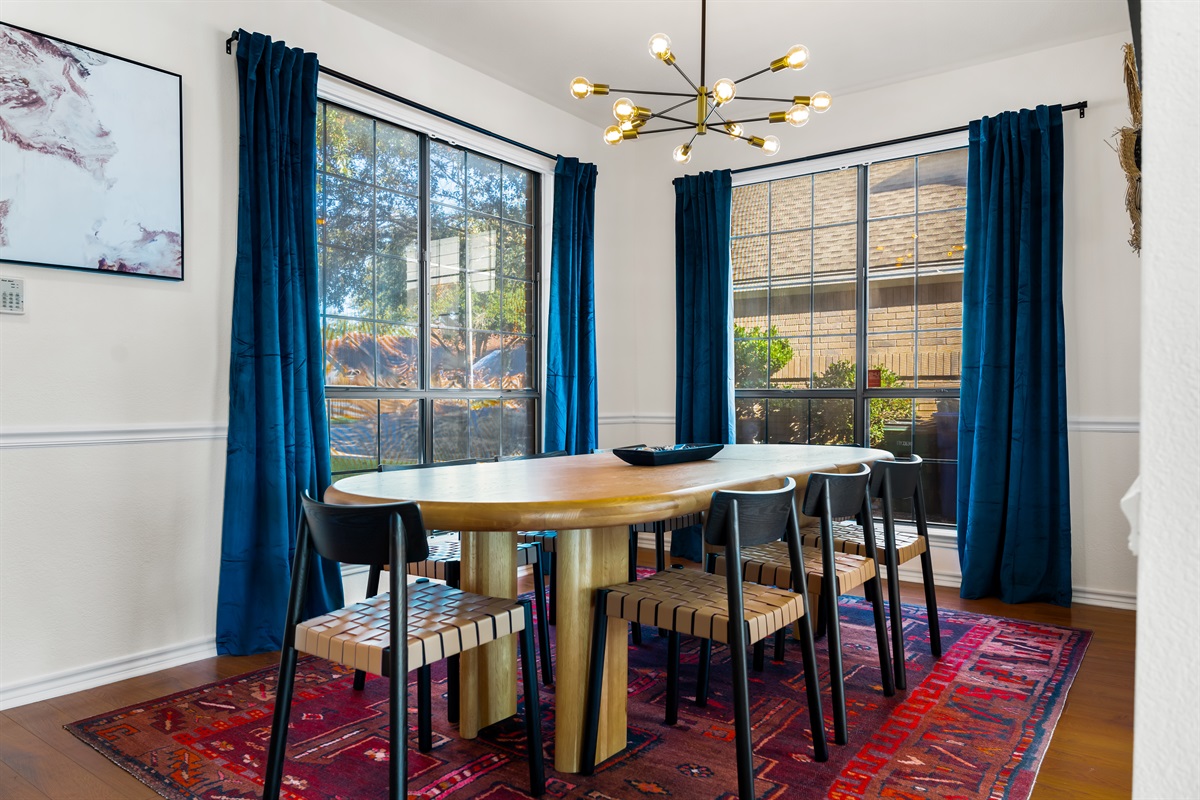 Sunlit gatherings around an 8-seat table on the dining room.