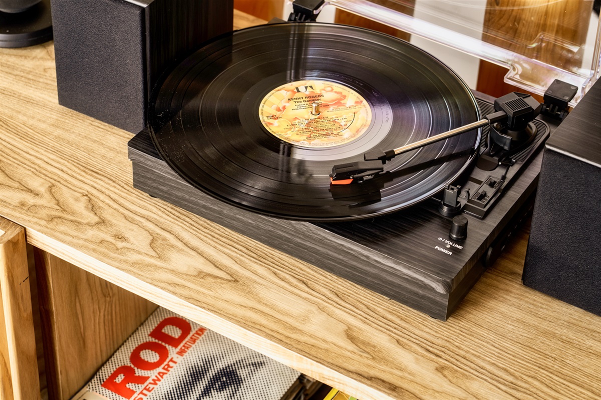 Discover the perfect harmony of comfort and nostalgia as you spin your favorite vinyl records amidst rustic charm.
