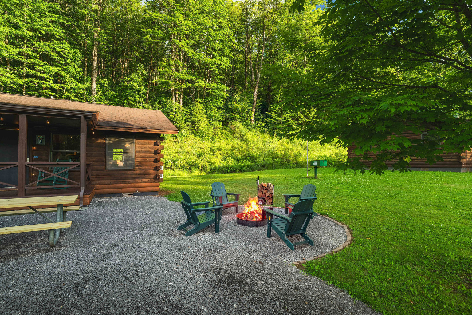 🪑 Bring the camp chairs out — peaceful settings in every direction. YES, we provide the Firewood!