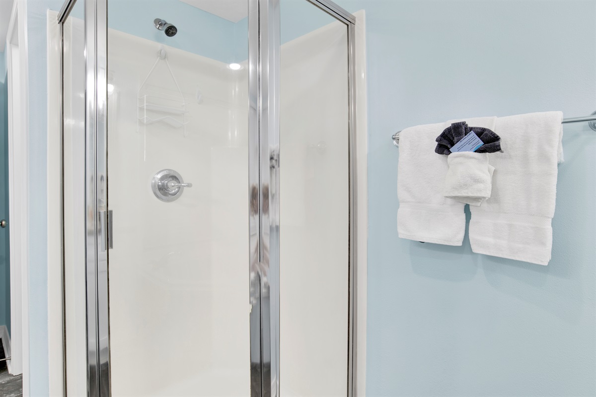 Primary Bathroom with 2 vanities, soaker tub, stand up shower and water closet toilet area