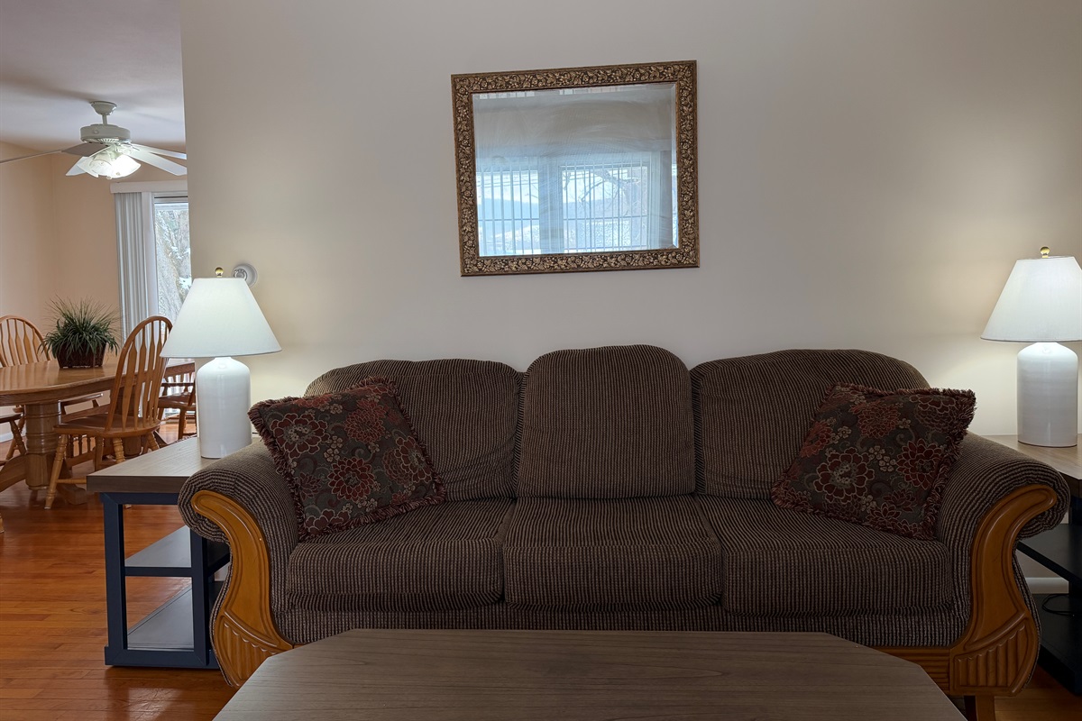 Living room with ding beyond