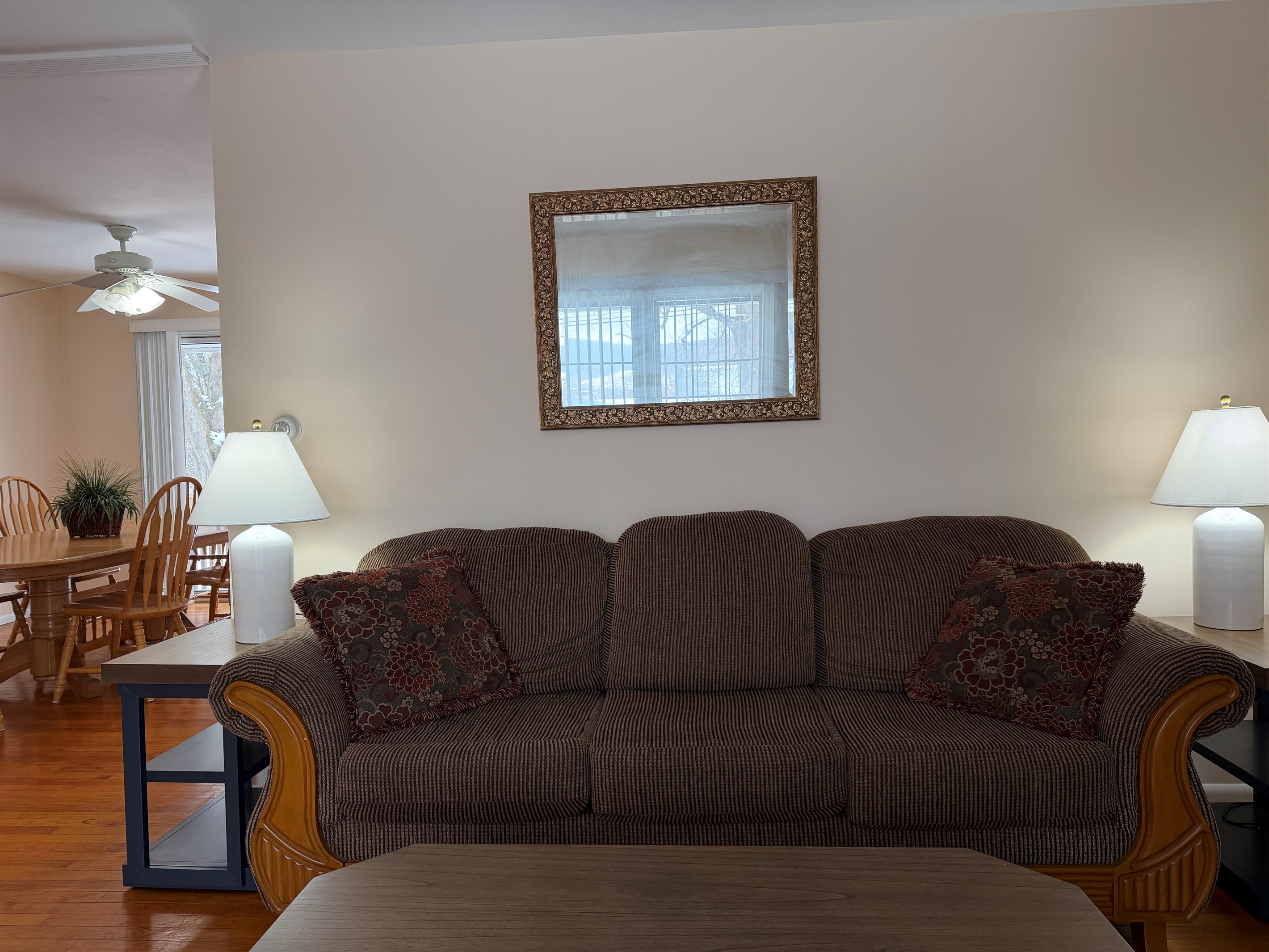 Living room with ding beyond