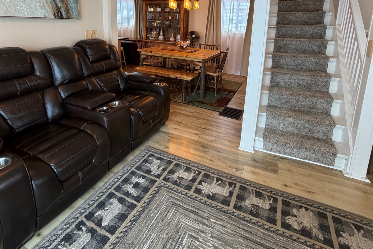 Living room with stairs to 2nd floor