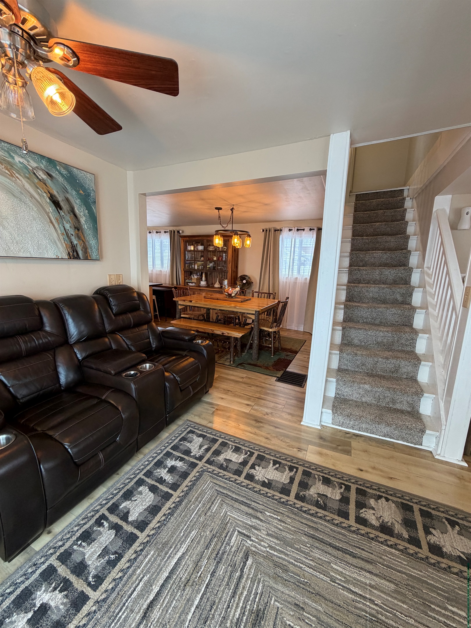Living room with stairs to 2nd floor