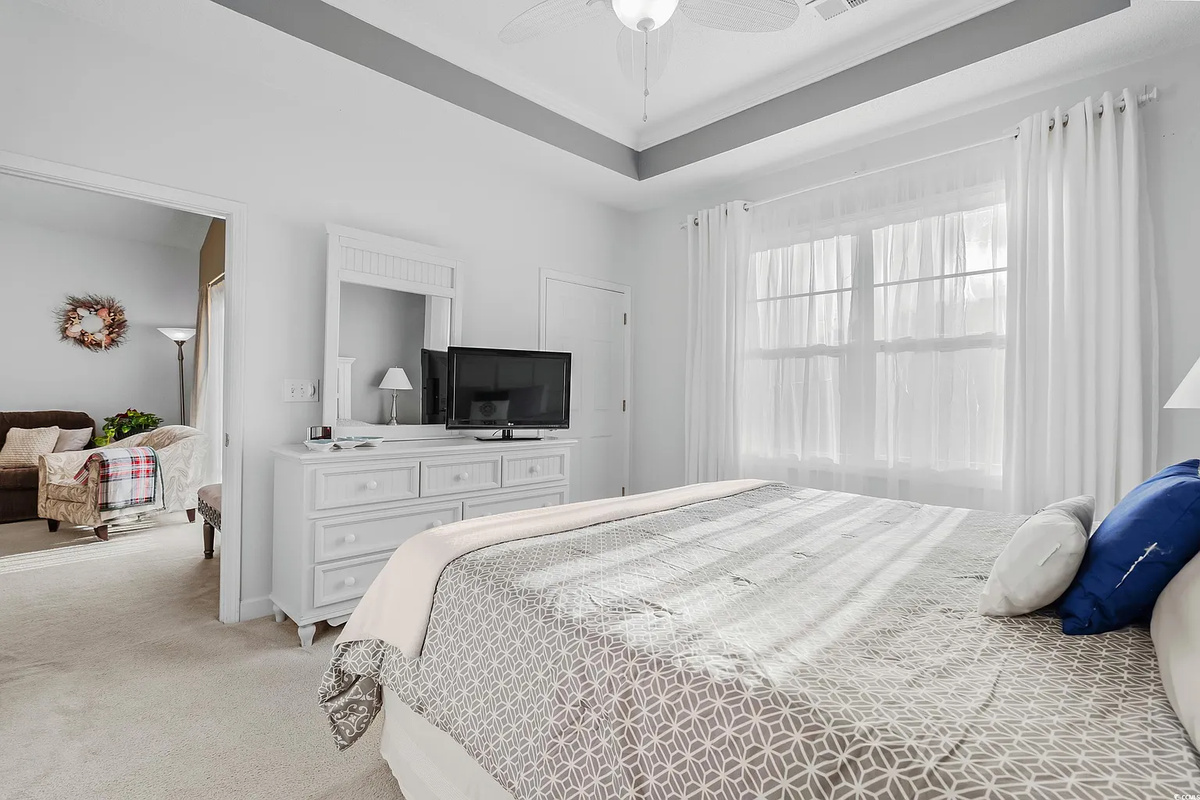 King bed in the main bedroom with ensuite