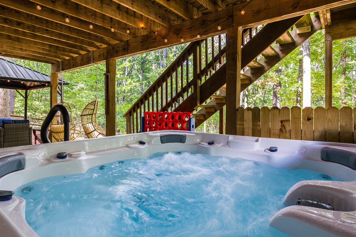 Gather with friends or family in the hot tub and enjoy a cozy evening surrounded by the sounds of the forest.