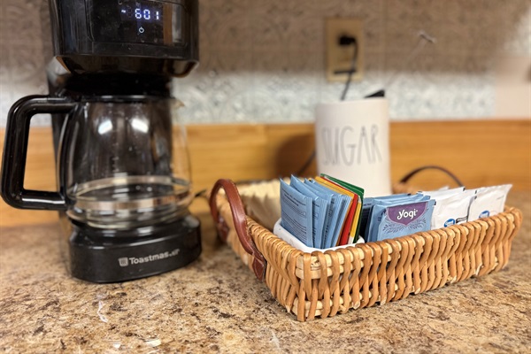 Ground coffee pot (coffee grinds and tea for your stay 