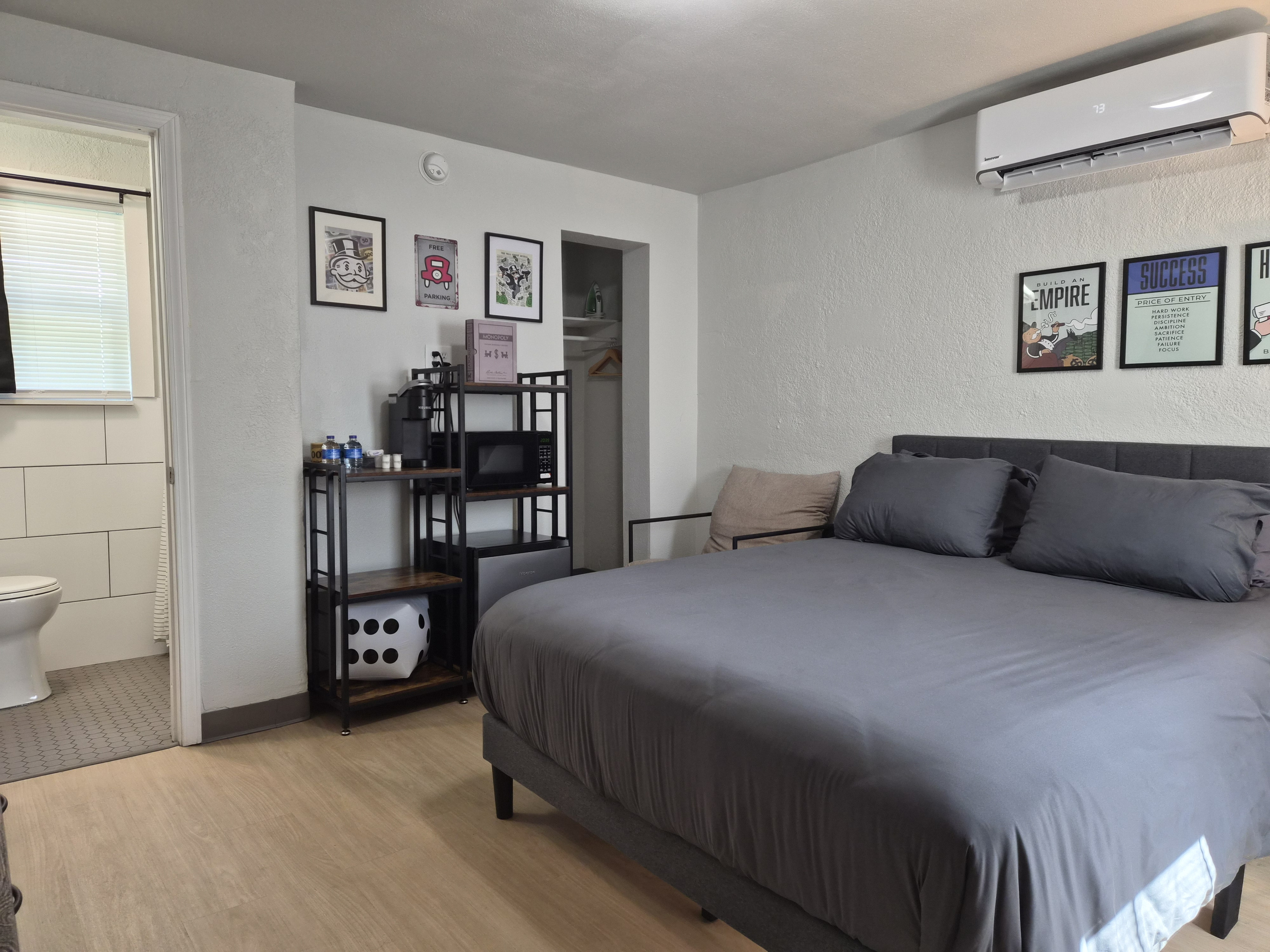 Queen bed, mini fridge, coffee maker, microwave