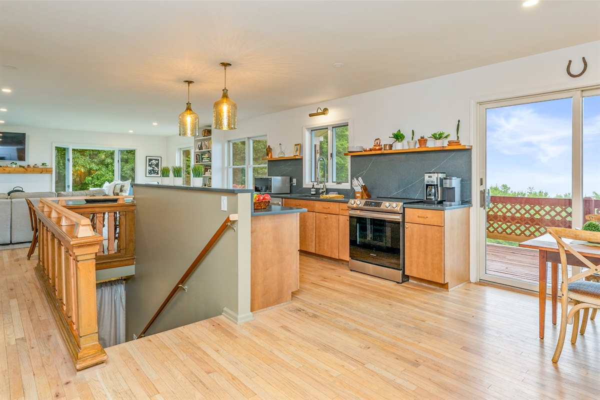 Indoor-outdoor living at its best—step from your kitchen onto the deck and soak in the peaceful countryside views.