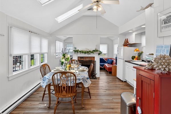 Dining space with seating for four, perfect for shared meals and simple moments at home.