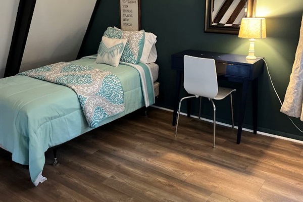 Loft bedroom with a twin bed