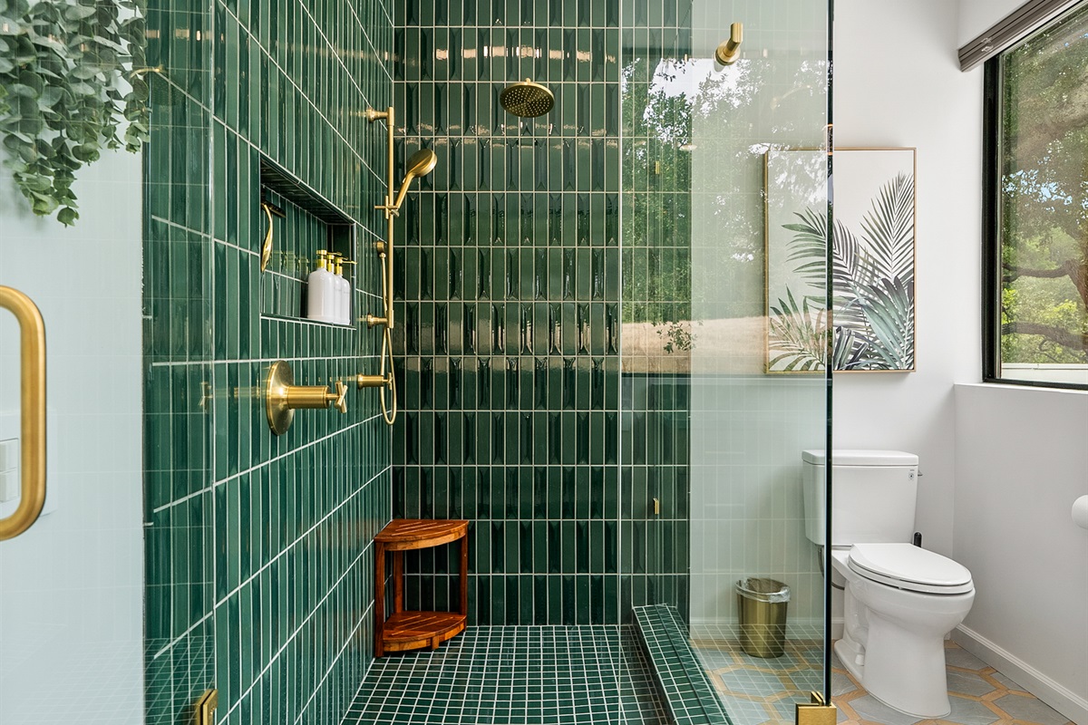 Take a refreshing shower in our “green with envy” space, designed to let you feel at one with the outdoors.