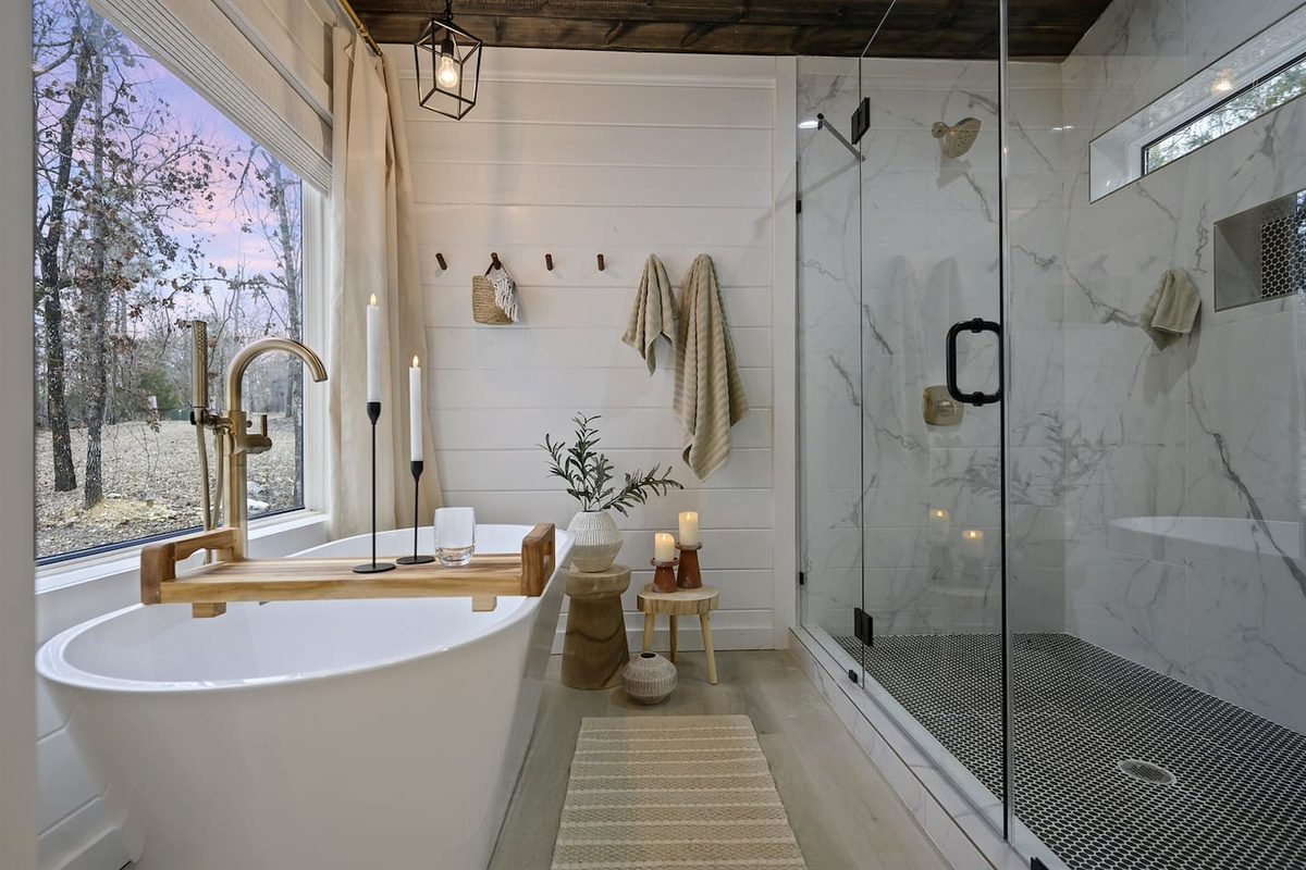 Bathroom Oasis: Indulge in a stylish escape with a stunning tub and sleek walk-in shower!