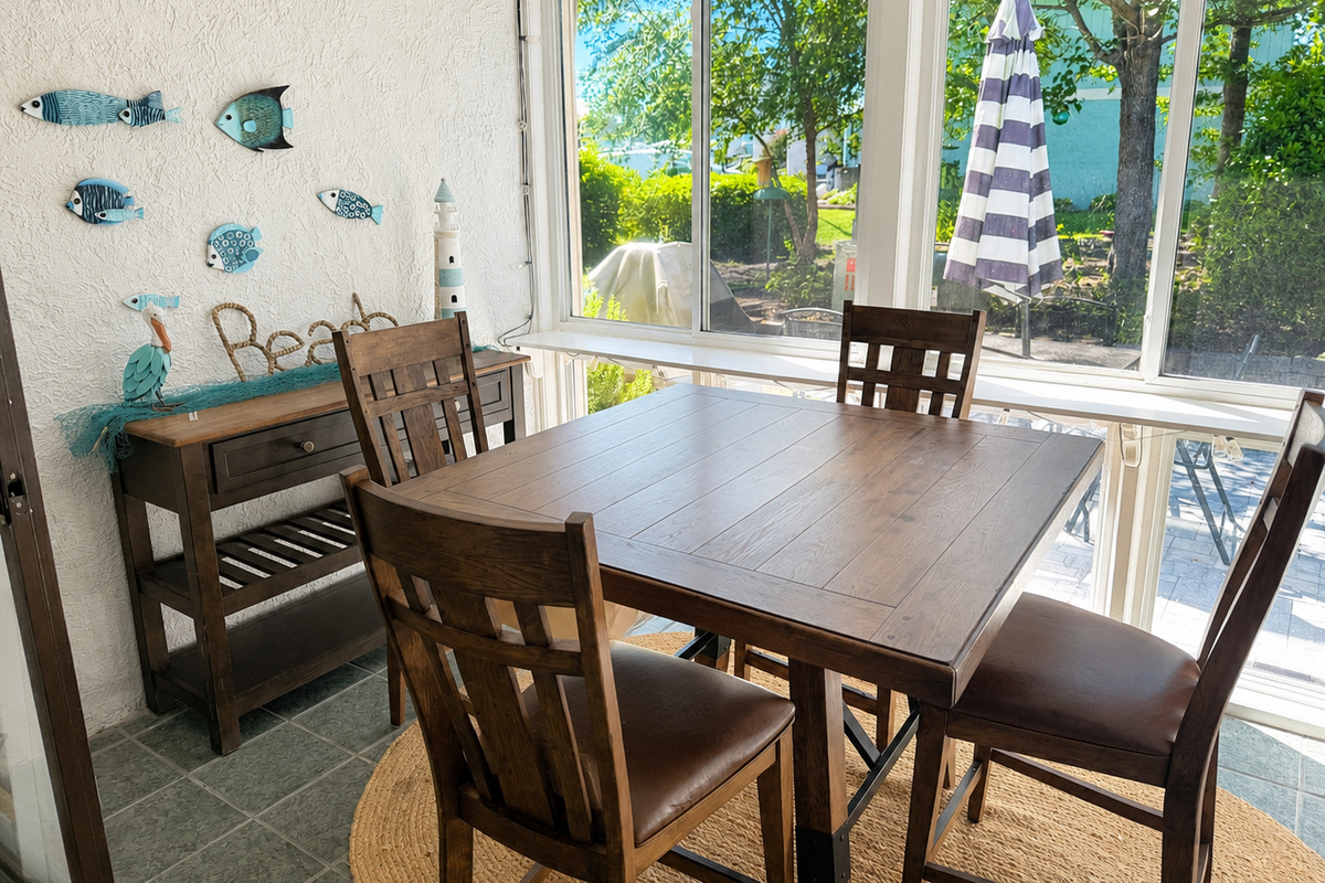 Enjoy morning coffee in the beautiful sunroom! 