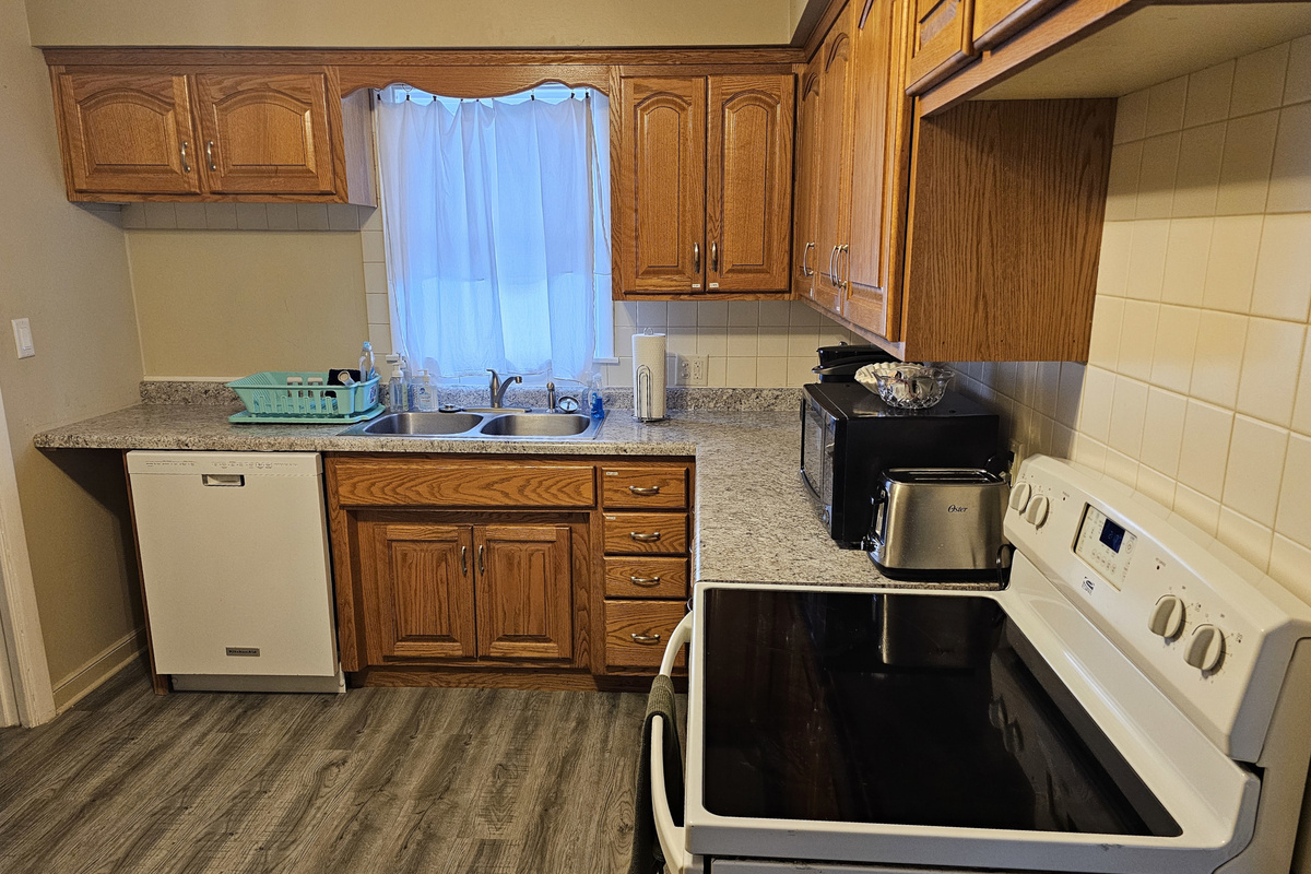 Full kitchen with stove, refrigerator, dish washer, microwave, coffee makers, pots/pans, and most other essentials.