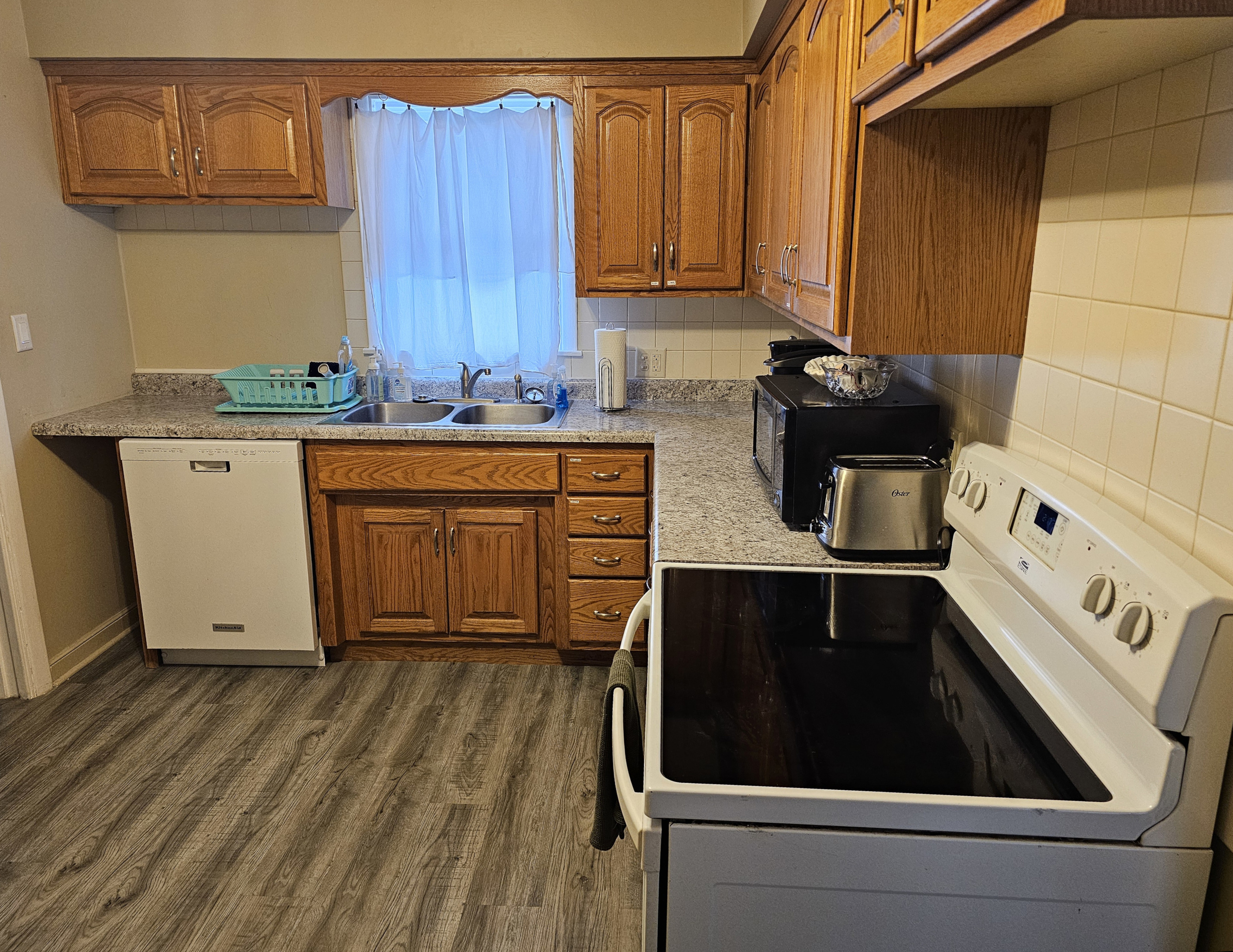 Full kitchen with stove, refrigerator, dish washer, microwave, coffee makers, pots/pans, and most other essentials.