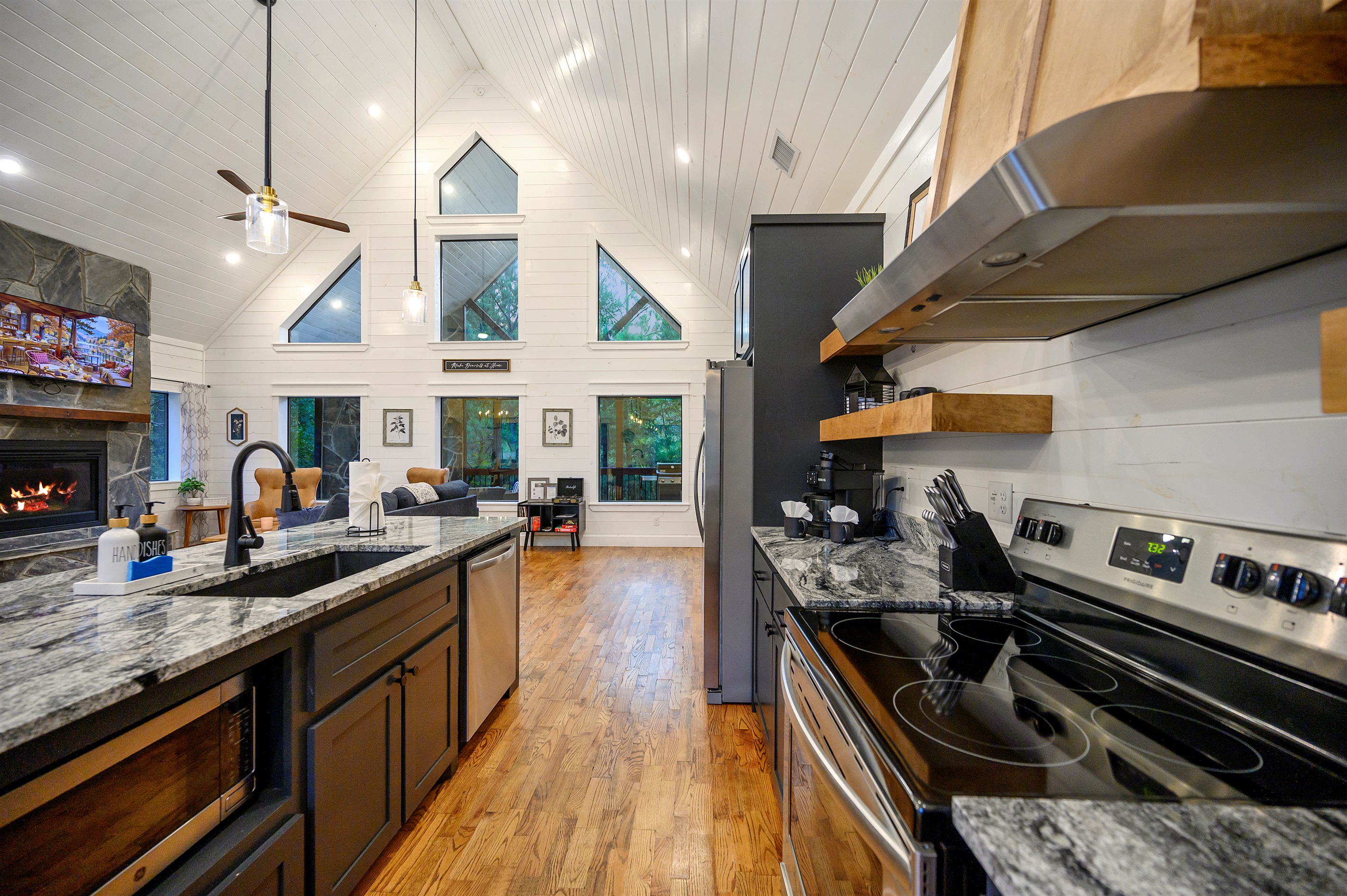 View from your Kitchen looking towards your Living Room & Back Deck area.