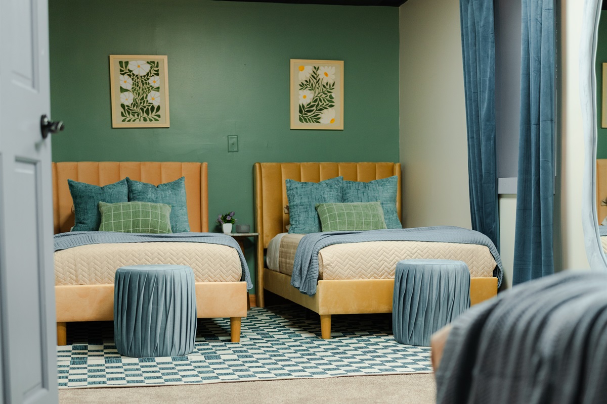 This double-bed room gives guests a comfortable and flexible sleeping setup.