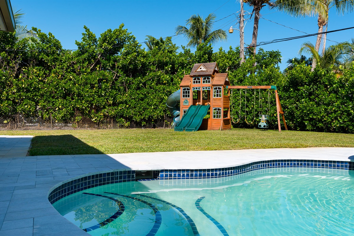 Swingset + sunshine = the perfect formula for a happy vacation.