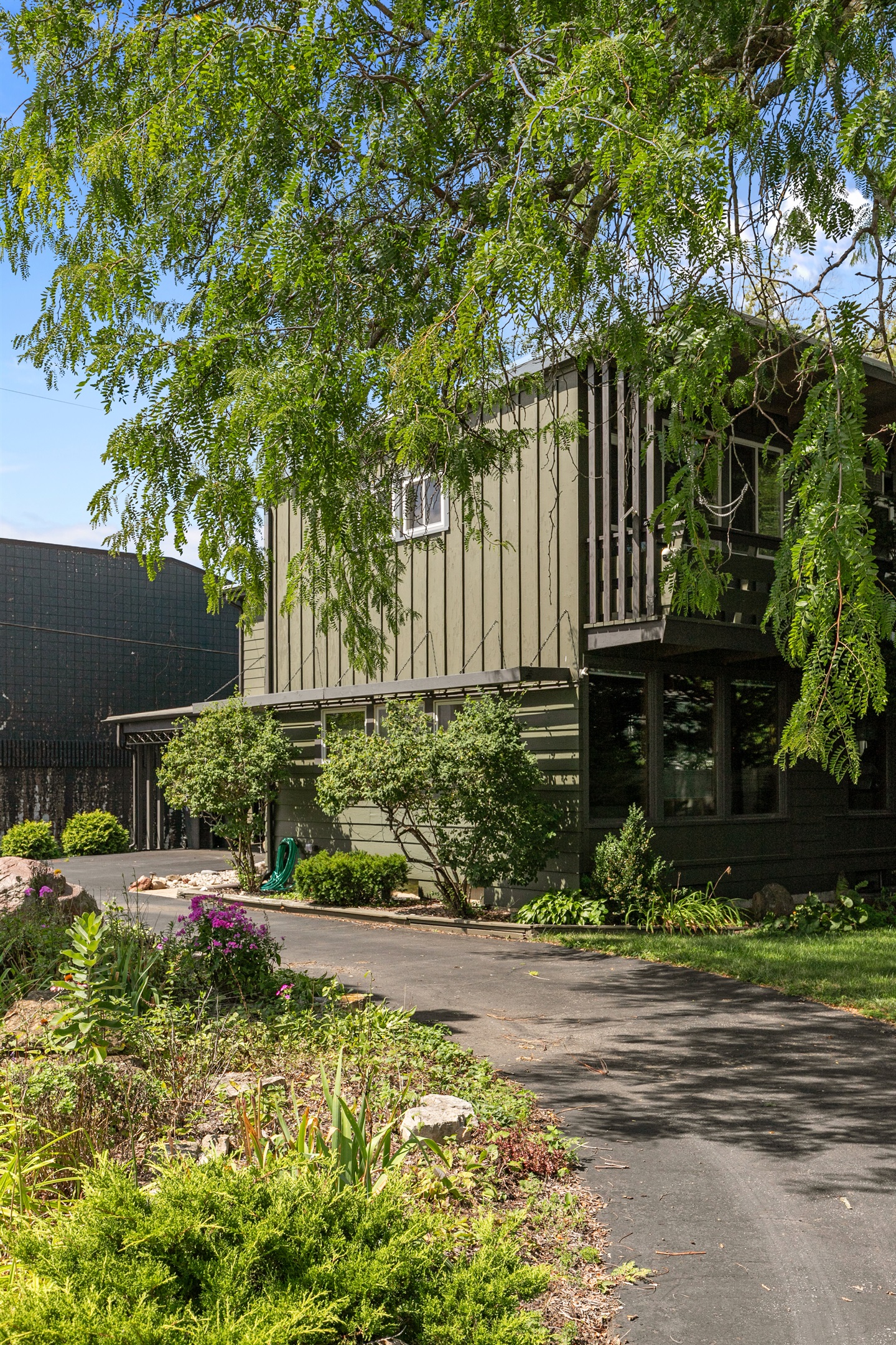 Enjoy the beautiful greenery surrounding the house, creating a peaceful and natural backdrop for your stay.