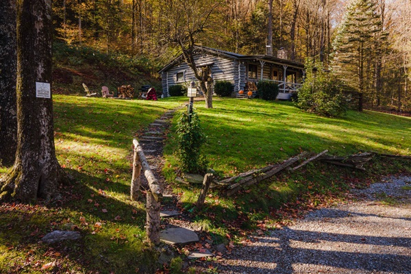 Follow the stone path to your secluded log cabin surrounded by nature and fresh mountain air.