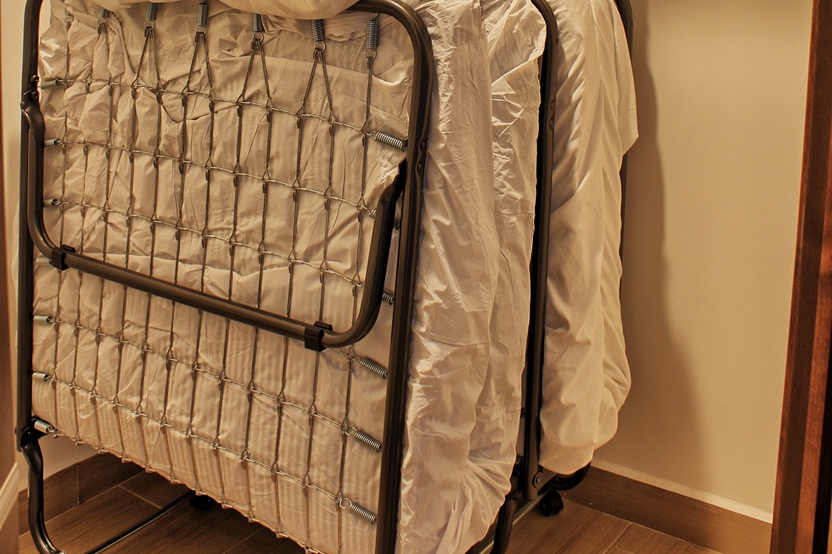 2 roll away twin single cots, located in guest bedroom closet. Best suited for children. Please take this into consideration when booking