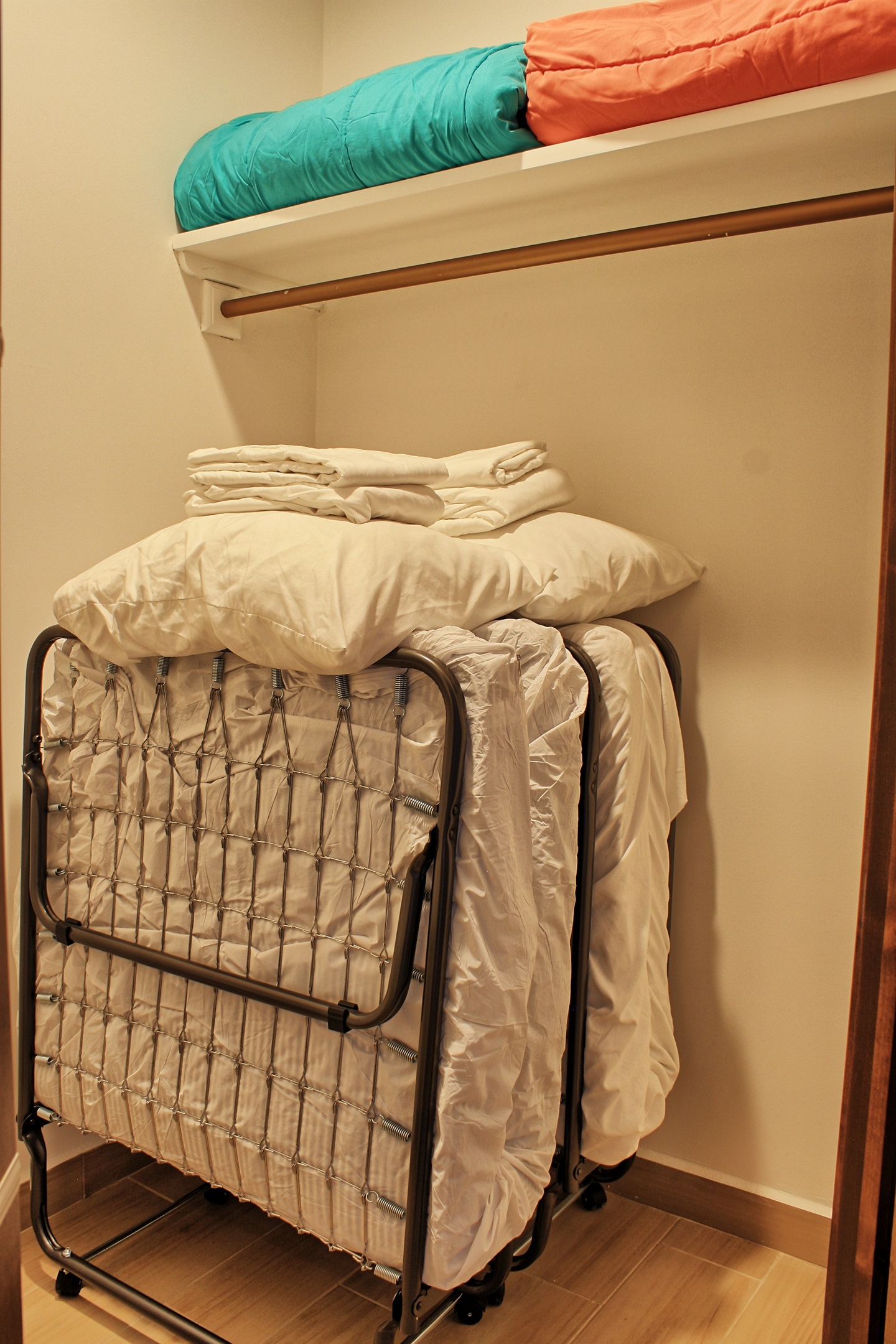 2 roll away twin single cots, located in guest bedroom closet. Best suited for children. Please take this into consideration when booking
