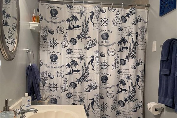 1st Bathroom is between Master Bedroom and 2nd Bedroom and has access to the hallway too. Shower with jetted tub. 