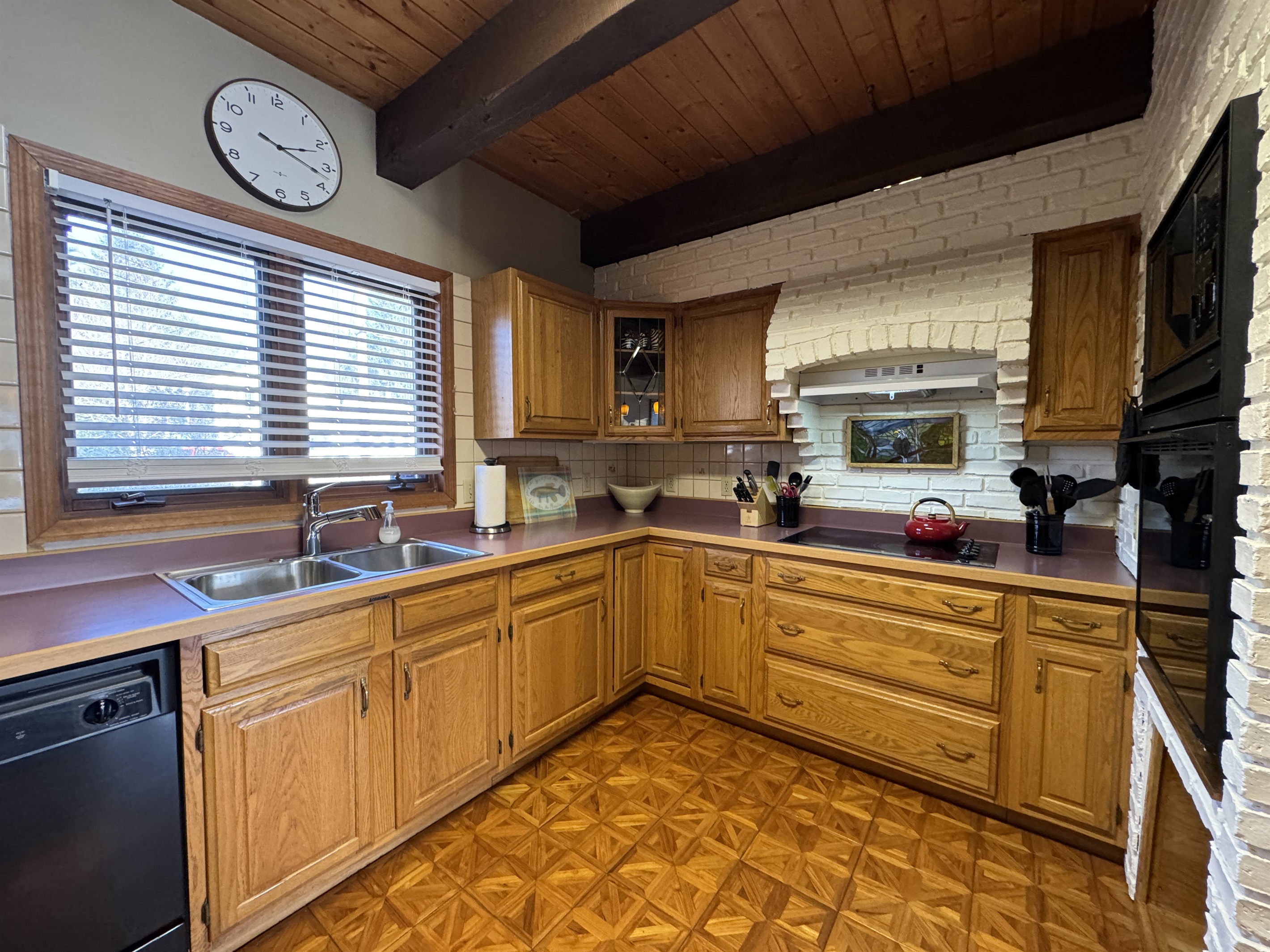 Camp Havon kitchen full view of cooking space and kitchen sink, plenty of room to cook in!