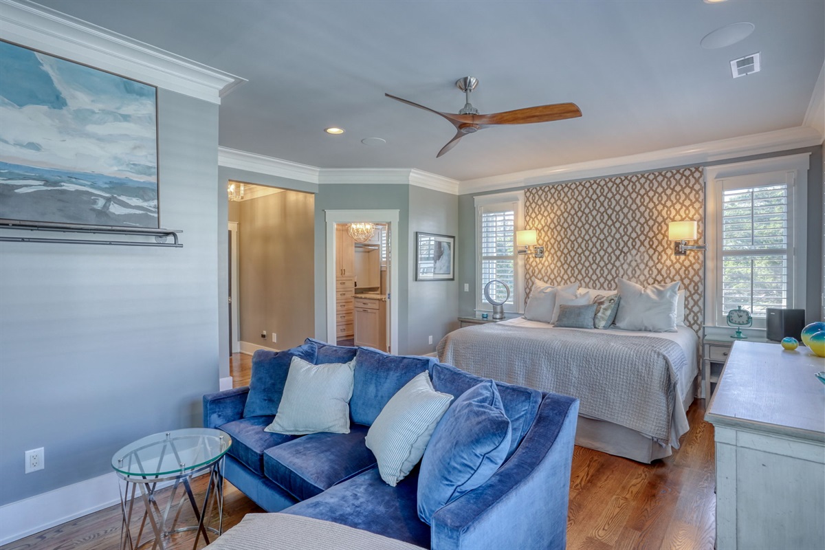 Wake up to soft morning light in the spacious primary retreat