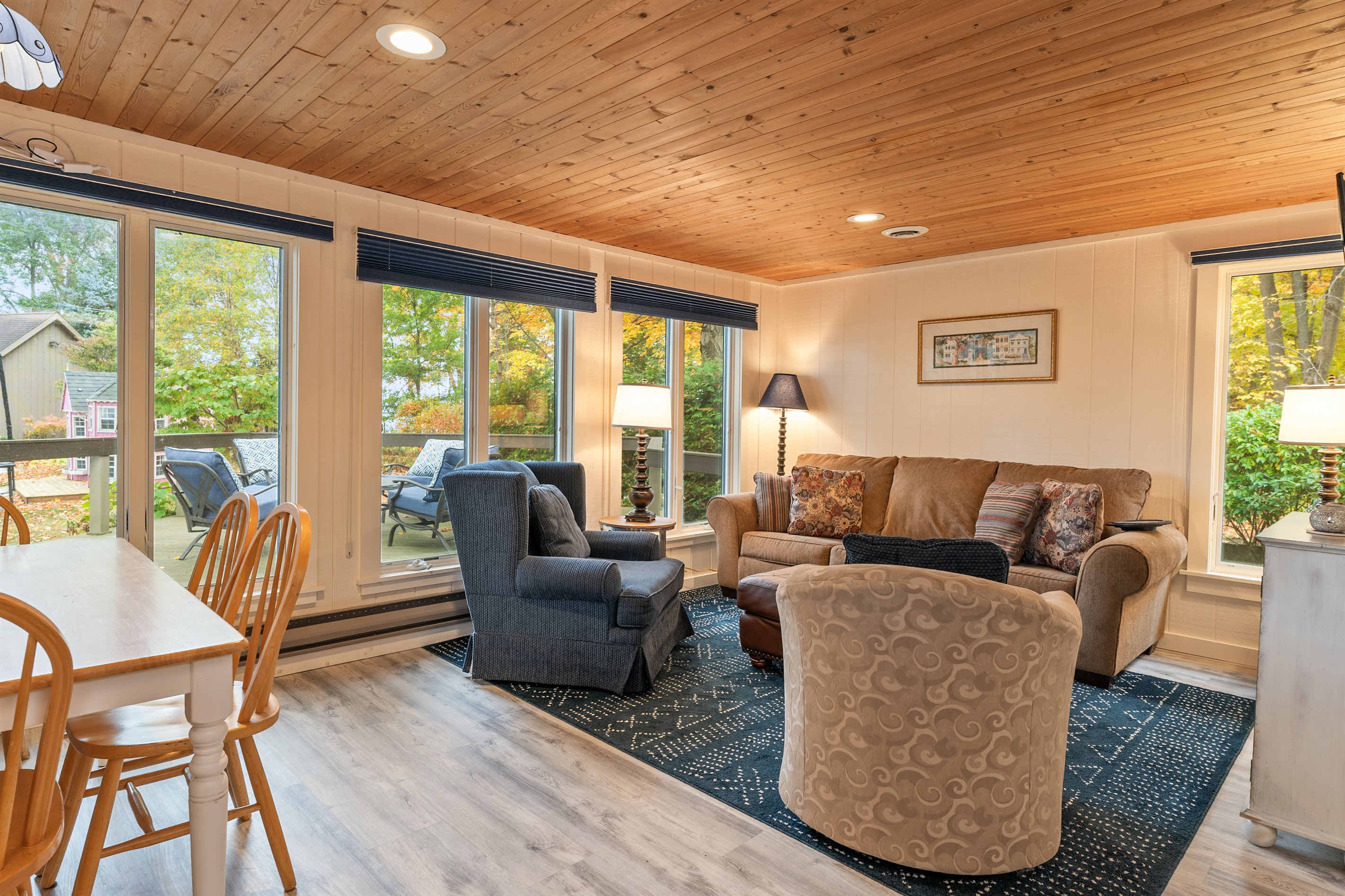 Open living area with large windows and plenty of natural light.
