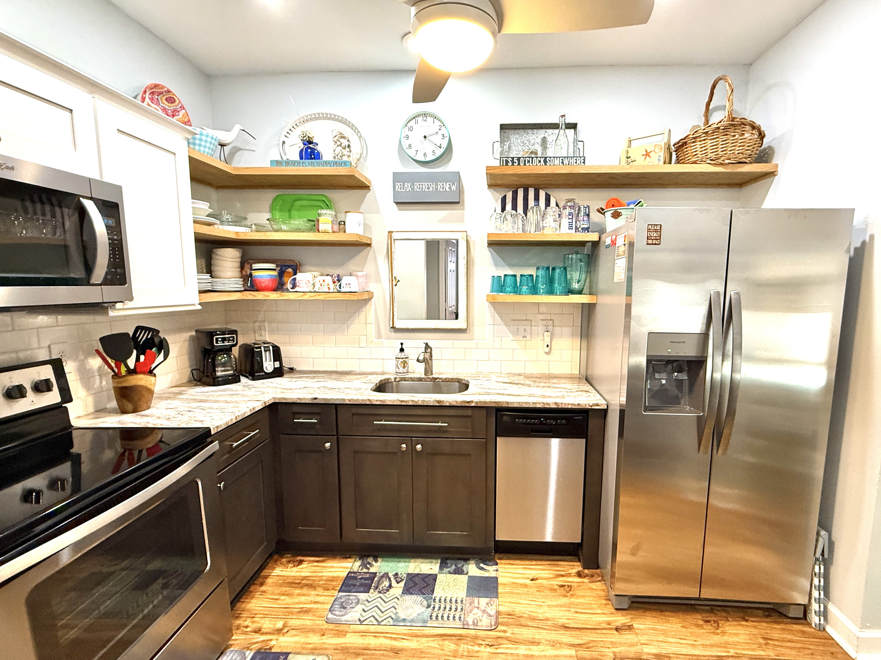 Provisions include coffee maker, electric kettle, toaster, crock pot, microwave, dishwasher