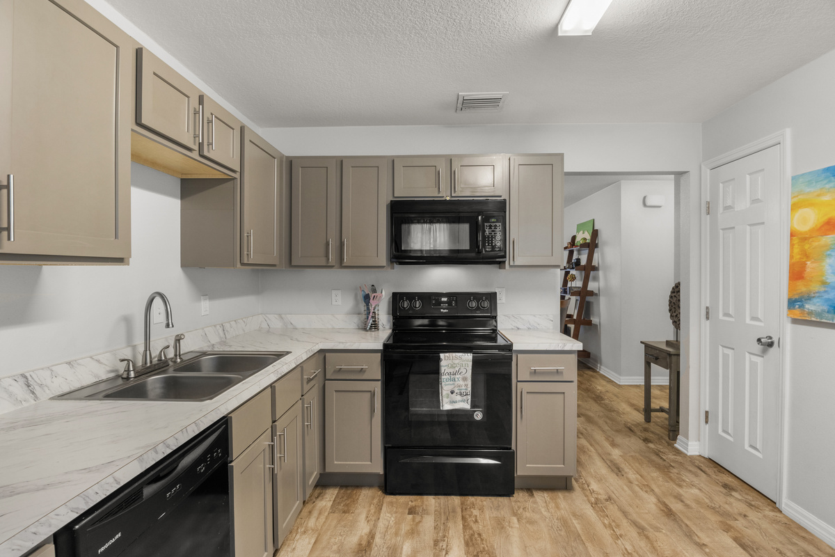 Kitchen range & microwave.