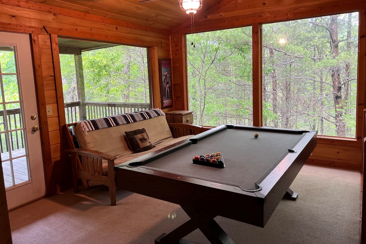 "While Playing Pool, Enjoy The Stunning Outdoor Views"