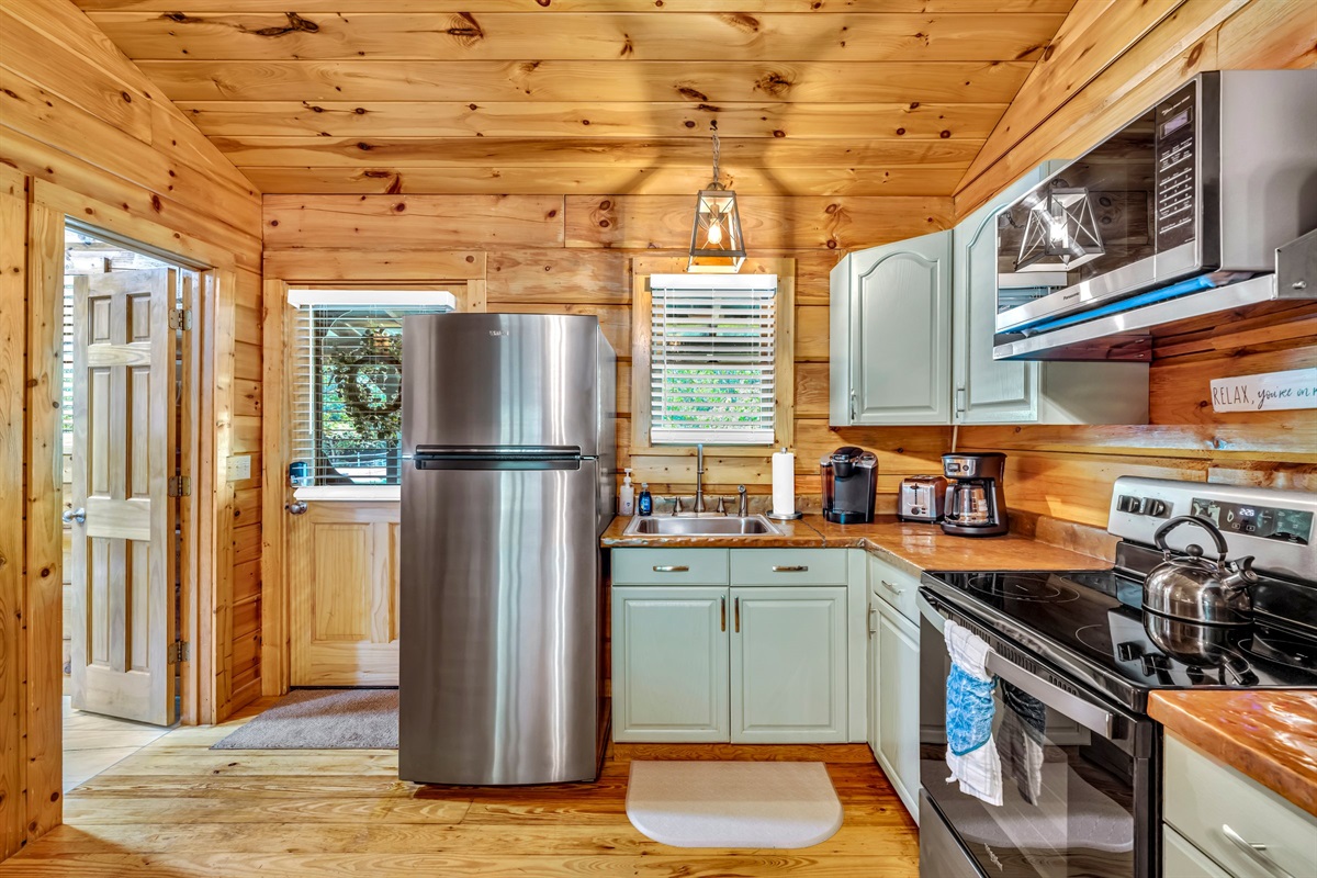 This kitchen has nearly everything you will need- except a dishwasher. Here we slow down and wash our dishes together by hand, or go out to eat!
