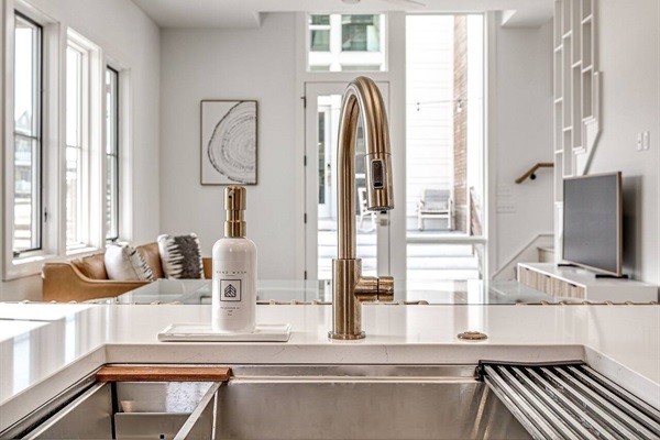 View from the kitchen island to the dining and living areas