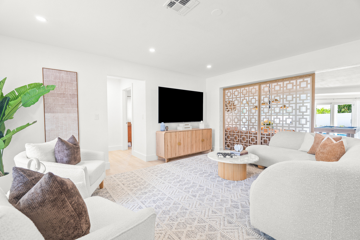 Sink into the comfort of this bright, beautifully designed living space