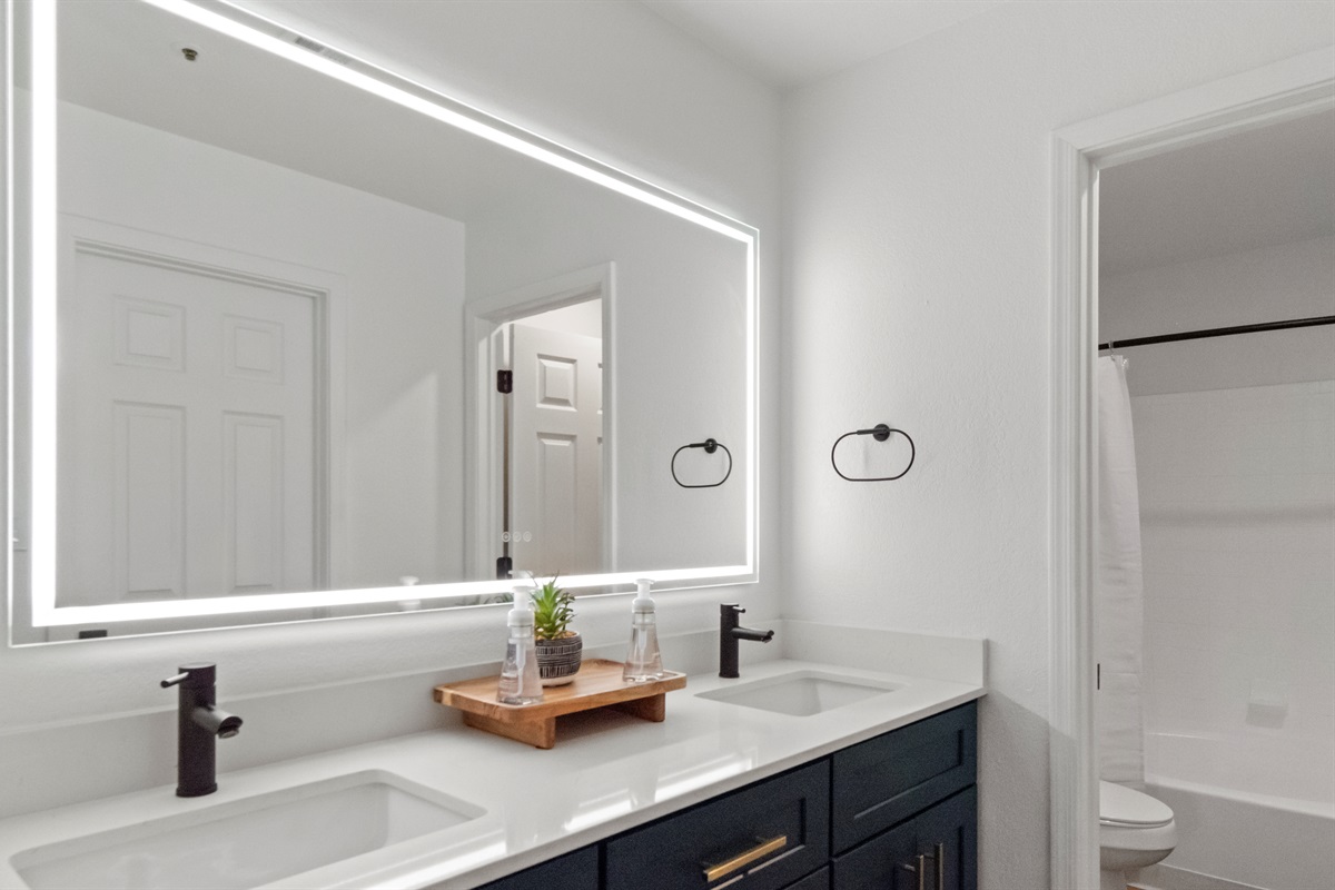 Bathroom stocked with basic essentials for guest comfort