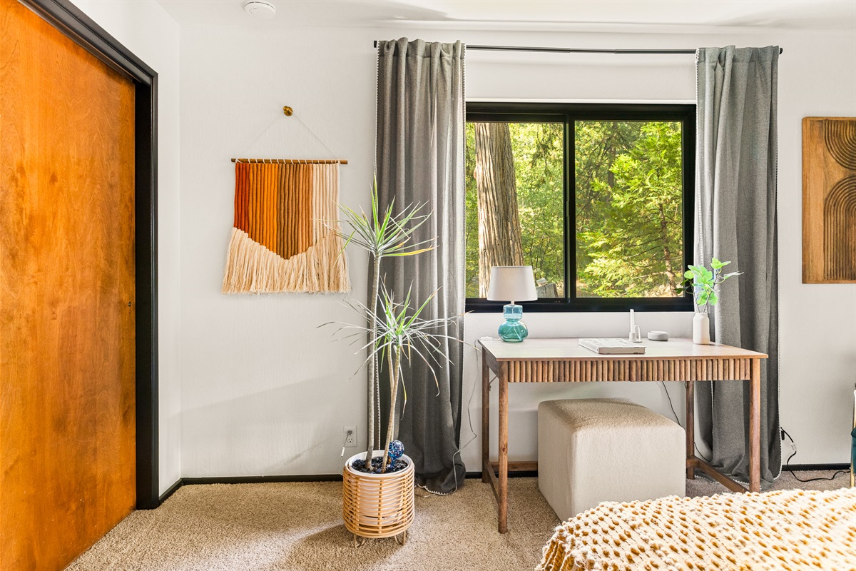 Bedroom 3: Experience the convenience of your own private workspace, allowing you to extend your vacation while comfortably working amidst the serene surroundings of Lake Arrowhead's trees.