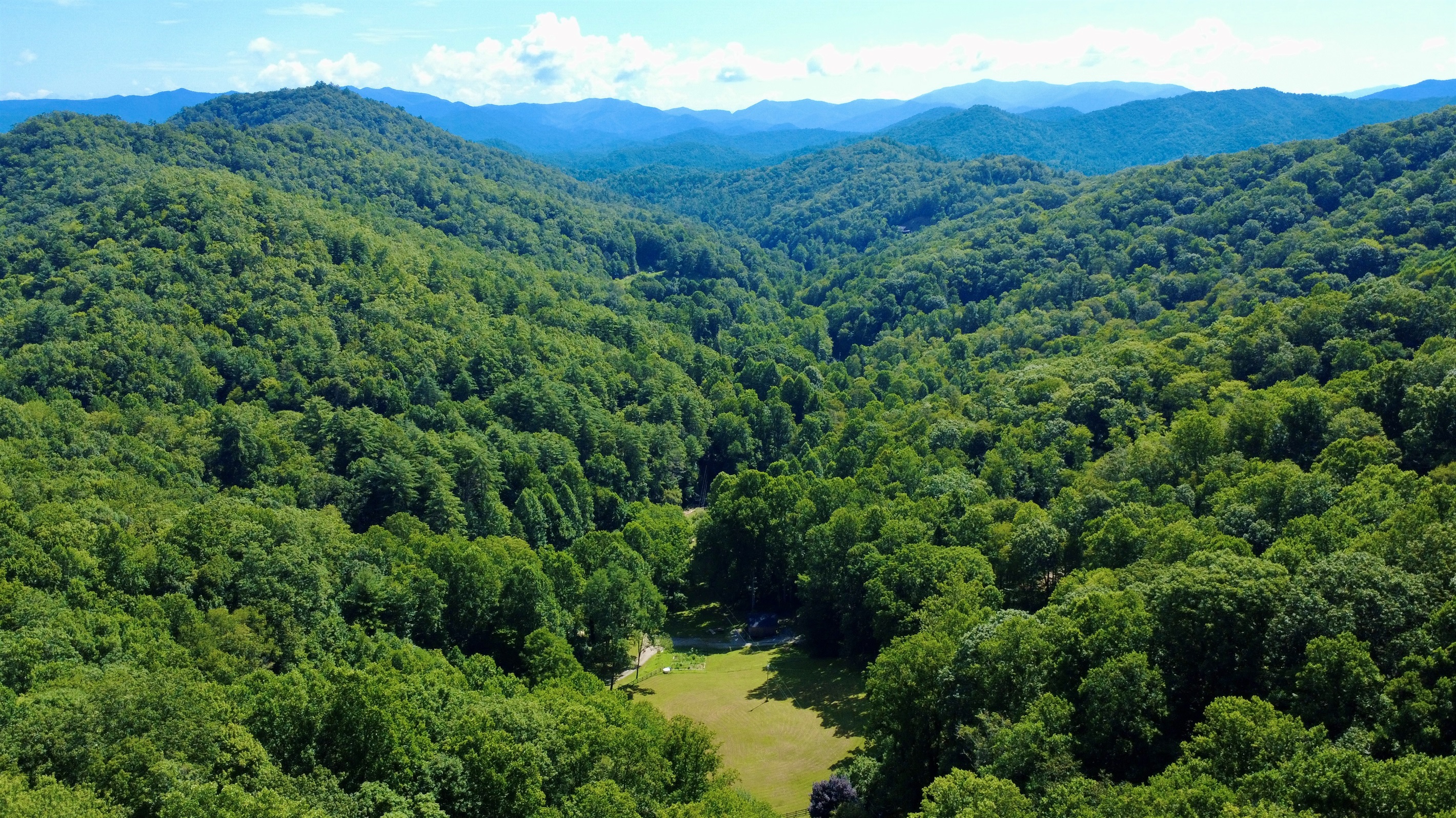 A small cleared patch in the mountains—your getaway awaits.
