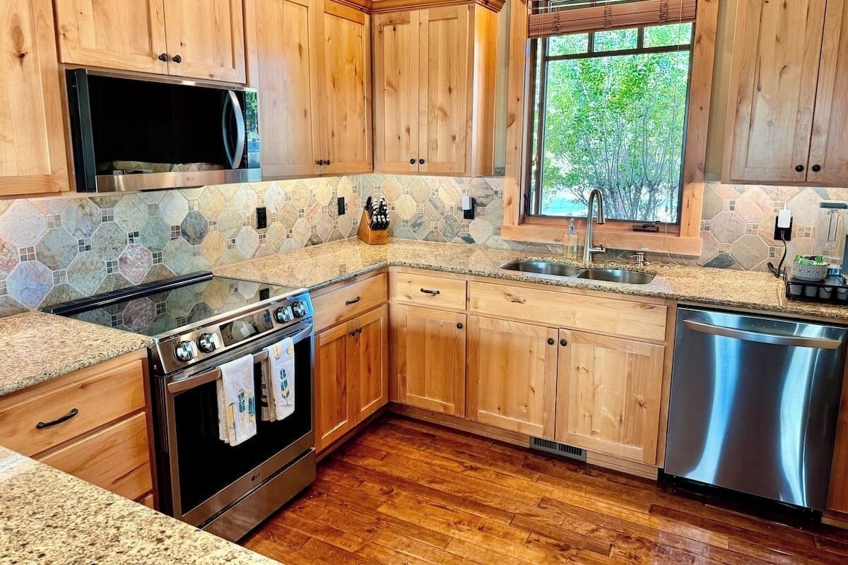 Kitchen with brand new 2024-year appliances (induction range)