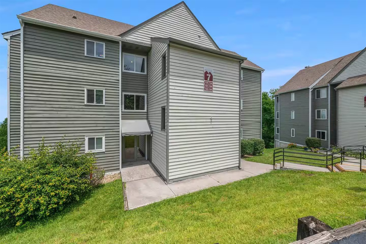 Enter under the awning on the right side